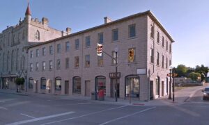 Exterior of Water Mixed Use Complex showing renovated historic Flour Mill with new commercial spaces and residences.