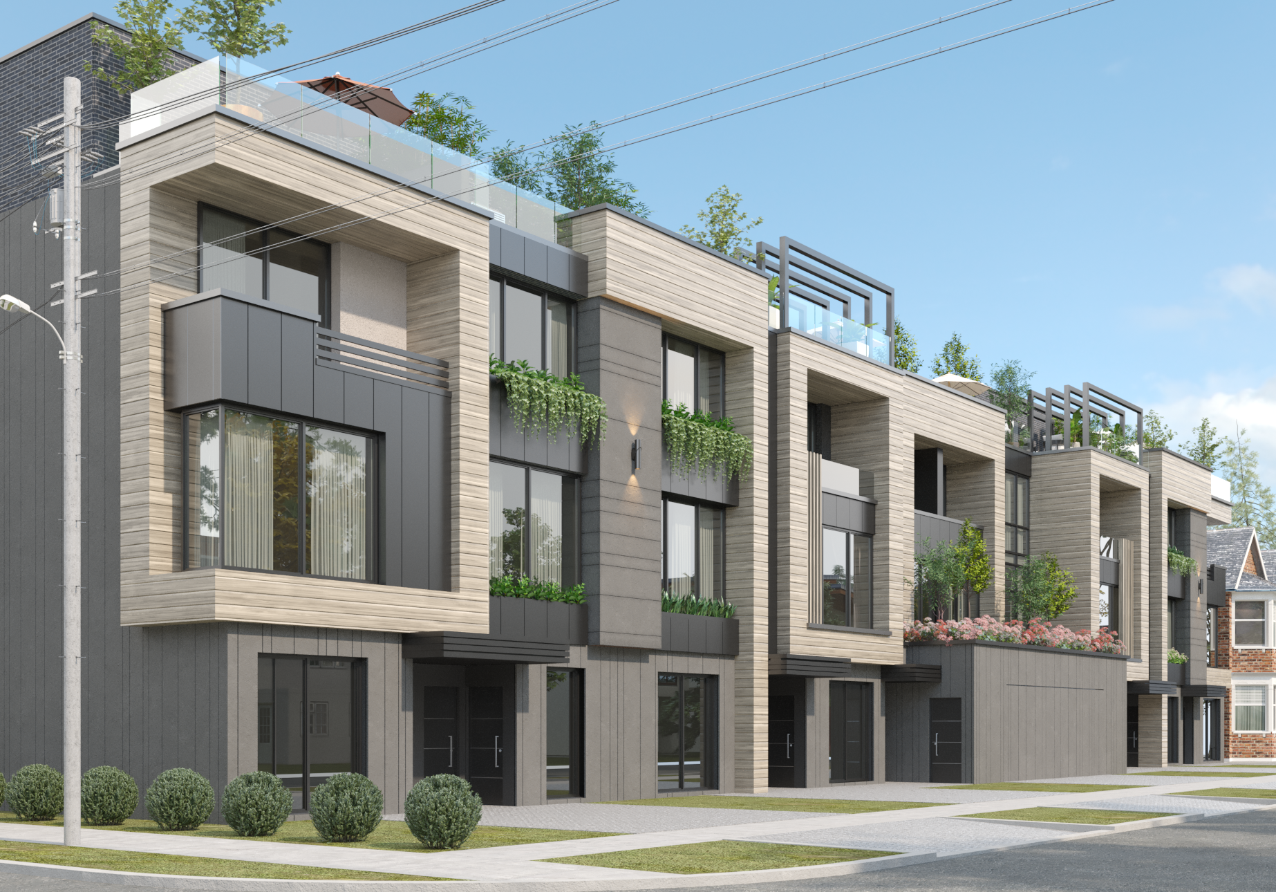 Modern townhouse development with wood and metal cladding, private balconies, rooftop terraces, and large windows — sustainable multi-unit residential architecture in an urban neighborhood.